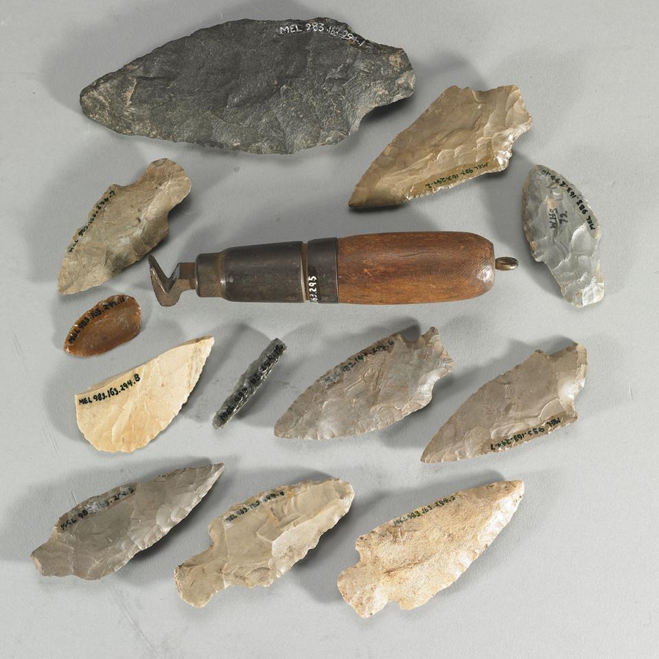 A collection of arrow heads with a hook