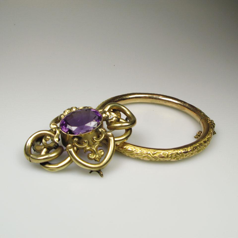 Victorian Gold and Gold-Filled Brooch set with an oval cut amethyst